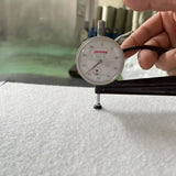 Water-swellable nonwoven padding for cables